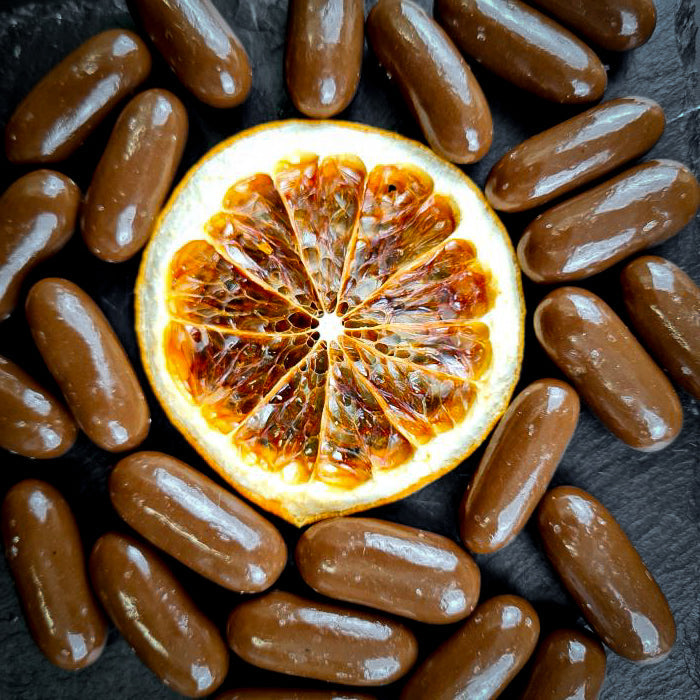 Dražejas ar apelsīnu cukātiem piena beļģu šokolādē